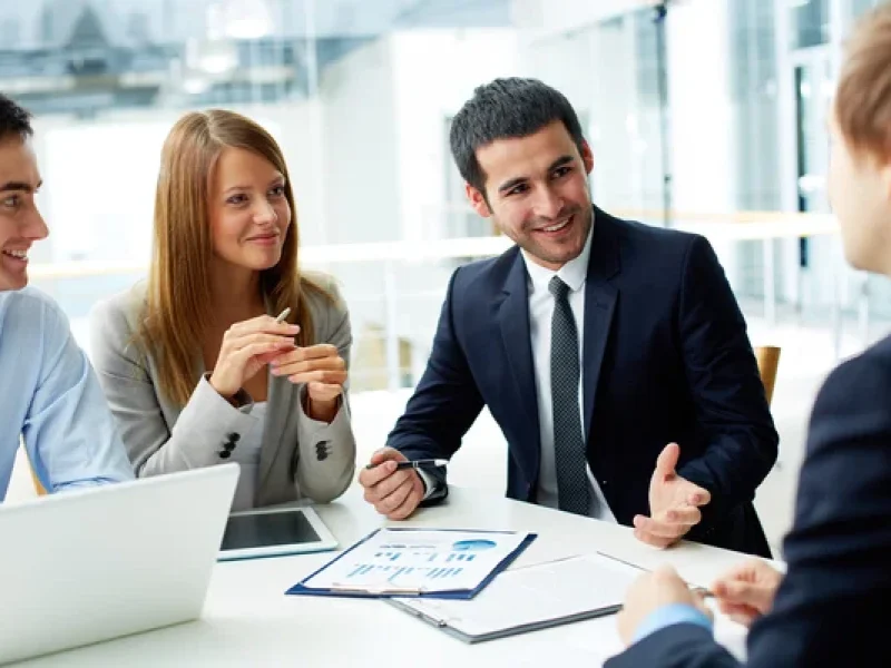 depositphotos_21186915-stock-photo-business-partners-discussing-documents